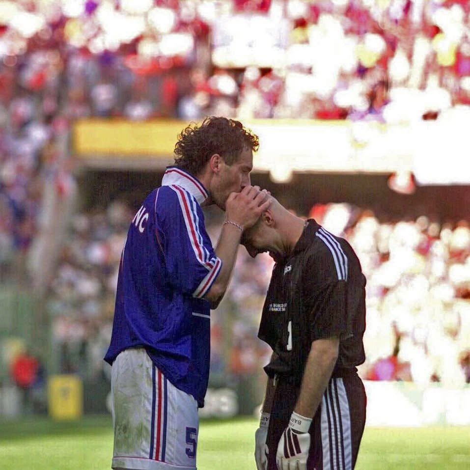 Laurent Blanc kissing Fabien Barthez's head at the 1998 World Cup, a famous football ritual